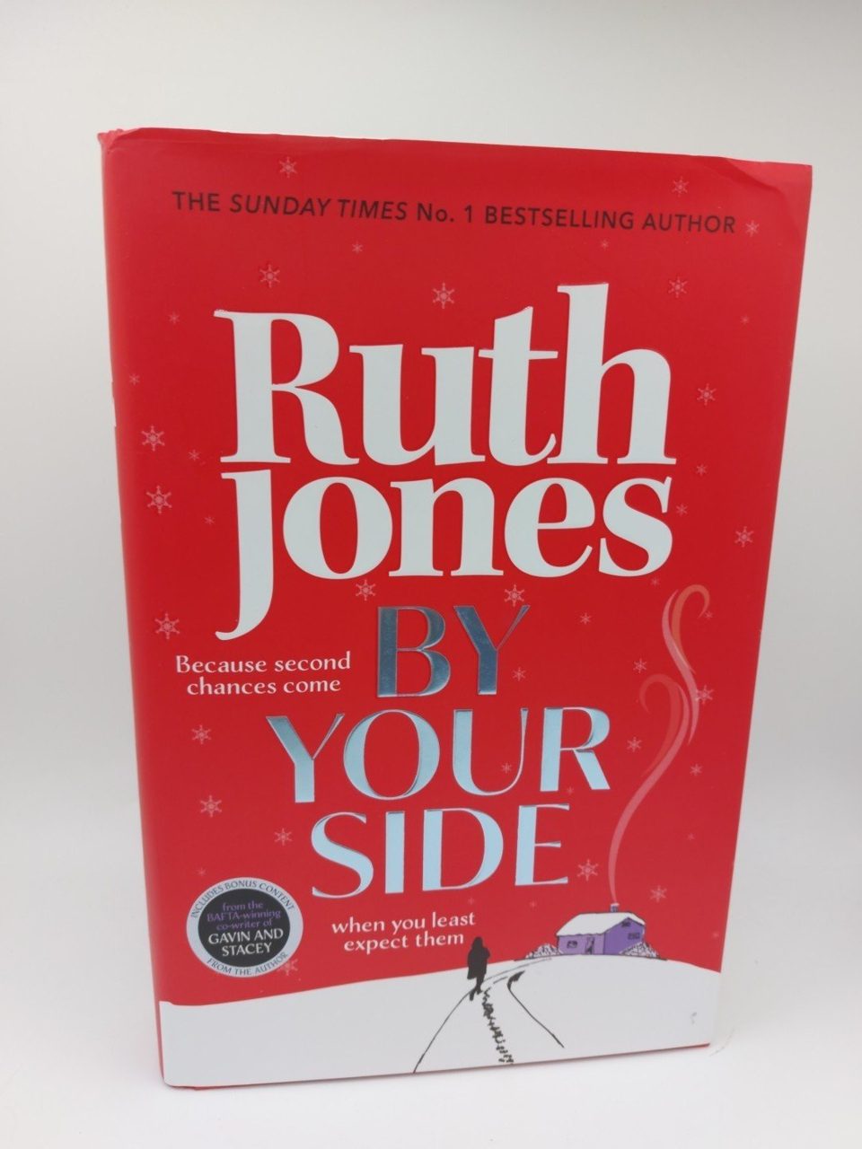 By Your Side, Ruth Jones, 1st Edition Includes bonus content.